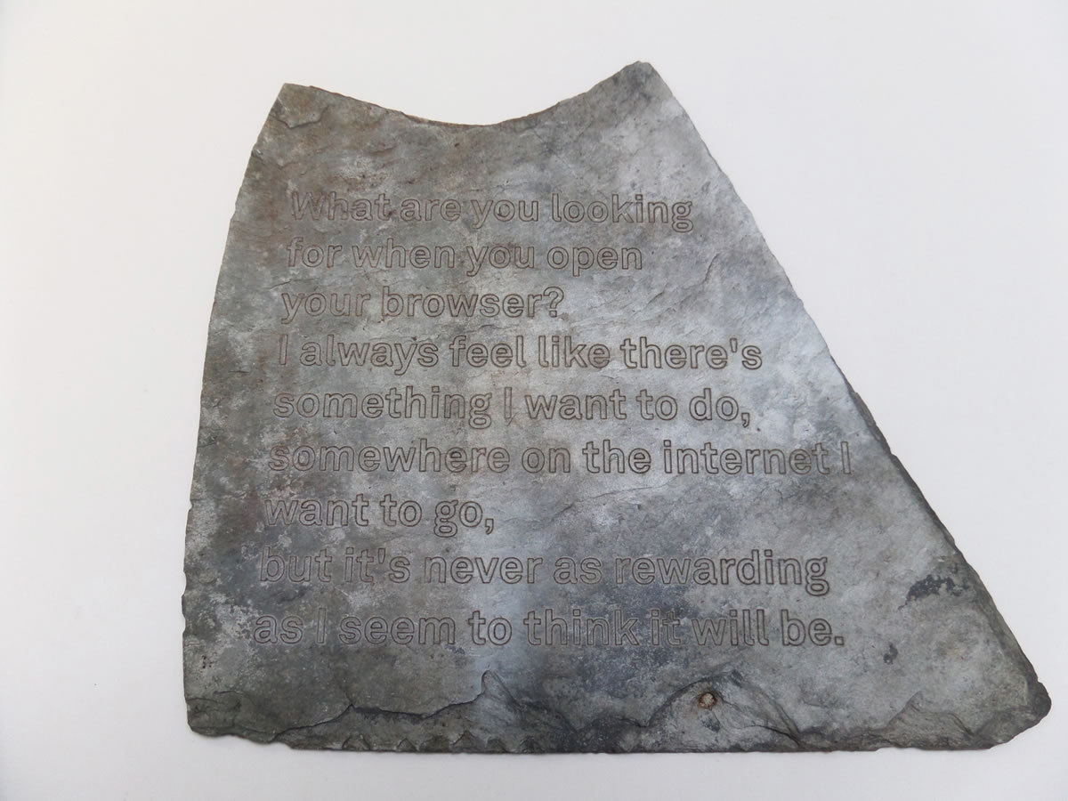 'Browser' - Laser engraved text from the internet on found slate, 2015